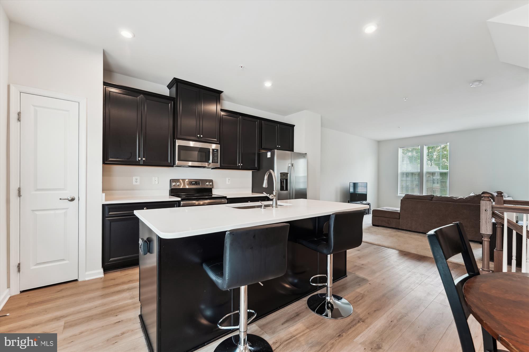 **$0 Down Payment is required for this home 🏡 2-1 Buydown Available — Paid by Lender! Ask the Agent! **Better Than New – Stylish Townhome at 56 Caswell Dr, Built in Late 2023! Why wait for new construction when you can own this nearly new, move-in-ready Ryan Homes townhome? Completed in June 2023, this 3-bedroom, 2 full/2 half bath residence offers 1,720 sq ft of thoughtfully designed, open-concept living with premium finishes and upgrades throughout.
Enter through the welcoming foyer into a spacious lower-level recreation room with access to the backyard—perfect for a home office, gym, or media lounge. Upstairs, the main level showcases a sun-filled living room, a sleek kitchen with stainless steel appliances, gas cooking, a breakfast bar, and a roomy dining area that leads out to a large Trex deck—ideal for outdoor relaxation and entertaining.
On the upper level, you'll find three generously sized bedrooms, including a serene primary suite with a walk-in closet and a spa-inspired bath featuring a vanity and glass-enclosed shower. A full-size washer and dryer, plus an additional full bath, add everyday convenience.
Enjoy modern comforts and features, including:
Wi-Fi-enabled smart thermostat
LED lighting package
Gas heating and cooking
Central A/C & electric heat
Attractive stone-accented, low-maintenance exterior
1-car garage + private driveway
Additional community guest parking available
Perfectly located just 1 mile from Route 210, this home offers quick access to Washington, D.C., Andrews AFB, and the Indian Head Naval Support Facility. Even better, it’s USDA loan eligible—which means qualified buyers may purchase with 0% down!
In today’s market, finding a home that combines style, space, and move-in-ready convenience is rare—this one checks every box. Schedule your private tour today and experience the comfort and value of 56 Caswell Dr!