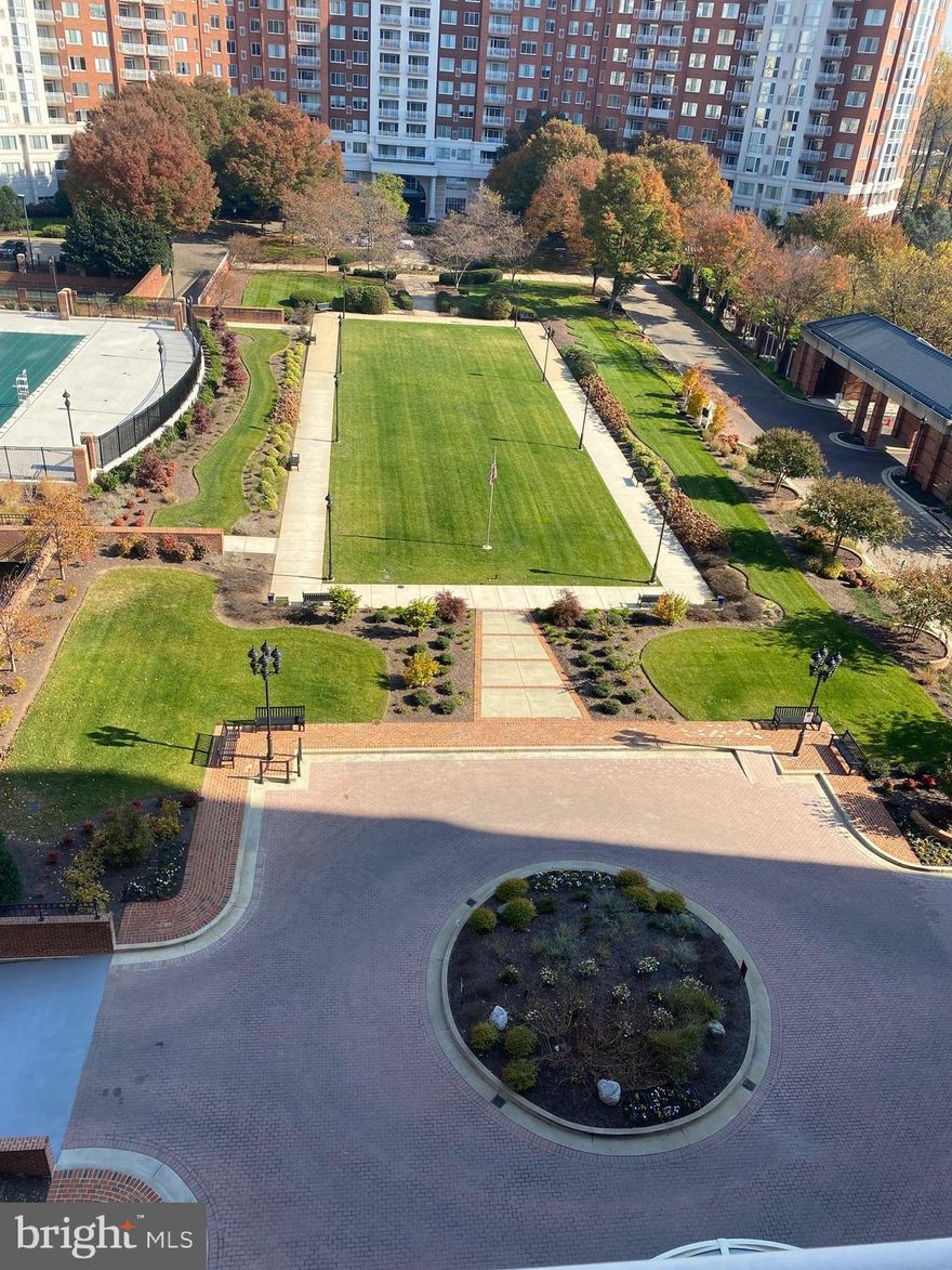 An incredible unit in a spectacular building! An expansive 2 bed/ 2.5 bath condo with deeded garage parking, unit 910 features hardwood floors,  high ceilings and THE most amazing views you can imagine. Overlooking one of the pools, tennis courts and manicured grounds, this is resort living in North Bethesda. The only decision to make is whether you will while your time away in this wonderful unit, with a fantastic balcony, or spend time in the tennis courts, pickleball courts, indoor/ outdoor swimming pools, bike rooms, gym, racketball court, library, games room etc etc.!
If you want to live and play close to Pike and Rose and still have access to DC and downtown Bethesda via metro (across the Pike) or road, you are in the right place!