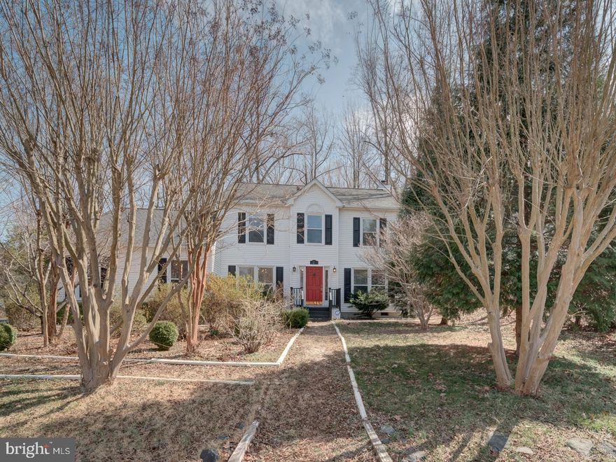 Welcome to your serene retreat in Aquia Harbor. Take advantage of the numerous community amenities offered by this meticulously maintained colonial-style home situated on a 0.72-acre lot. It's move-in ready with neutral color schemes and gorgeous hardwood flooring throughout the main level. The property includes a spacious family room featuring a semi-open layout and a cozy wood-burning fireplace, perfect for enjoying the views of the trees in the backyard and entertainment area. The first floor is completed by a formal dining area, an office space, and a laundry room. Upstairs, the generous primary suite boasts high ceilings, an ensuite bathroom with double sinks, and a walk-in closet. Additionally, there are two more sizable bedrooms and a full bathroom with a tub on the upper level. This home provides ample storage, including an oversized attached 2-car garage with a designated storage area and a large driveway. Don’t miss out on this bright and inviting home—schedule your tour today!
 There is a $1,500 association move in fee for tenants.