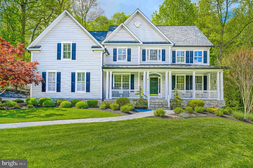 This stunning custom-built Selfridge home has been meticulously updated and maintained inside and out, and is designed for homeowners that appreciate all of the details. Listed as a 4 bedroom, there is plenty of room for all, with an additional office/TV room upstairs and a guest room in the lower level. Situated on a private cul-de-sac of six custom homes, you will love the option of sitting on your traditional front porch and greeting neighbors or enjoying the peaceful retreat of your private backyard. Throughout the home, you will find hardwood flooring, plantation shutters, decorative molding, and many more thoughtful touches.

A new gourmet kitchen is the heart of the home, featuring an oversized island, quartz countertops, solid wood custom cabinetry, a Monogram built-in refrigerator, a professional 48-inch gas range, an under-counter microwave, and a separate ice maker. Enjoy your coffee or read a book in the exquisite four-season, English conservatory overlooking the peaceful yard. Perfect for entertaining, the kitchen connects to the family room for an open-concept feel, while the main level also offers a traditional layout with a separate office, a spacious dining room, a formal living room, a two-story foyer, and a back staircase.

The upper level features a bright primary suite with hardwood floors and soaring ceilings. There is plenty of space to add a sitting area, and the updated en-suite bath boasts dual counters and sinks, a large soaking tub, a separate shower, and a massive walk-in closet. Three more generous bedrooms, two recently renovated bathrooms, and a bonus room complete this floor.

Head down to the lower level to find versatile, multi-use spaces to make your own. It is perfect for a hangout, guest area, gym, movie room, or all of the above! Tons of storage space and options are right at your fingertips.

Additional updates include James Hardie siding, a new roof, HVAC, a water heater, a washer and dryer, backyard fencing, epoxy garage floors, and more! With a tucked-away location surrounded by nature yet close to schools and all the amenities of Ellicott City and River Hill, 12315 Fawn River Way has the best of all worlds! You will love this home!
