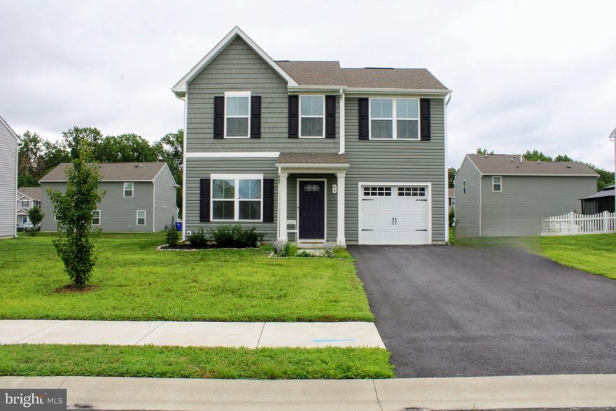 Welcome Home!!  No need to wait for new construction when you can enjoy this 3-year-old home! This charming Colonial home in the desirable Stonington community offers a perfect blend of modern comfort and inviting warmth. Built in 2023, the open floor plan creates a seamless flow throughout the living spaces, ideal for both relaxation and entertaining. With three spacious bedrooms and two and a half bathrooms, this residence is designed for convenience and ease. Step outside to enjoy the lovely paved patio, perfect for morning coffee or evening gatherings. The attached garage and ample driveway space provide plenty of parking for guests. Safety is prioritized with a security system, smoke detectors, and carbon monoxide detectors in place. Explore local shops and dining options just a short drive away, making this home not just a place to live, but a place to thrive.
