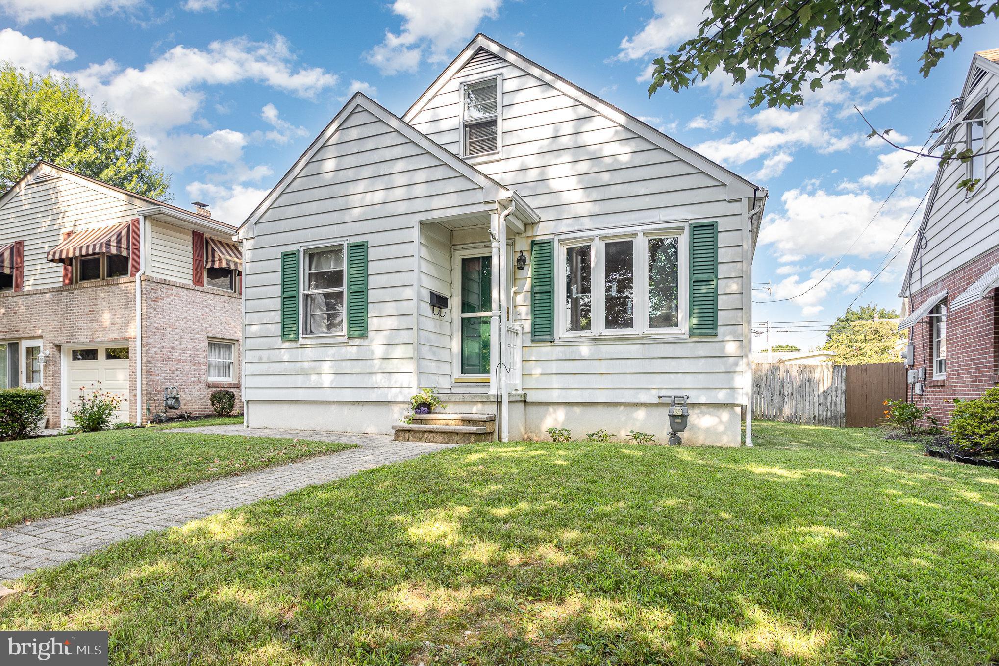Welcome to 1004 E Walnut St, a delightful 3-bedroom home full of charm, warmth, and character in the Hanover Public School District! Step inside to find a cozy living room with soft carpeting, beautiful wood-trimmed doors and windows, and plenty of natural light pouring in through two large front windows. The bright and inviting dining room features built-in cabinetry, a side buffet counter perfect for small appliances or serving space, and room for gathering with family or friends. The kitchen has a cheerful personality with its white and blue cabinetry, blending function and vintage flair. Downstairs, you'll love the finished basement with a family room and built-in wet bar, an ideal space for entertaining, movie nights, or game day. Outside, the spacious backyard is ready for cookouts, gatherings, or simply enjoying a peaceful evening. Whether you're a first-time buyer or looking to downsize, this well-loved home offers a great mix of comfort, character, and convenience, all in a central Hanover location.