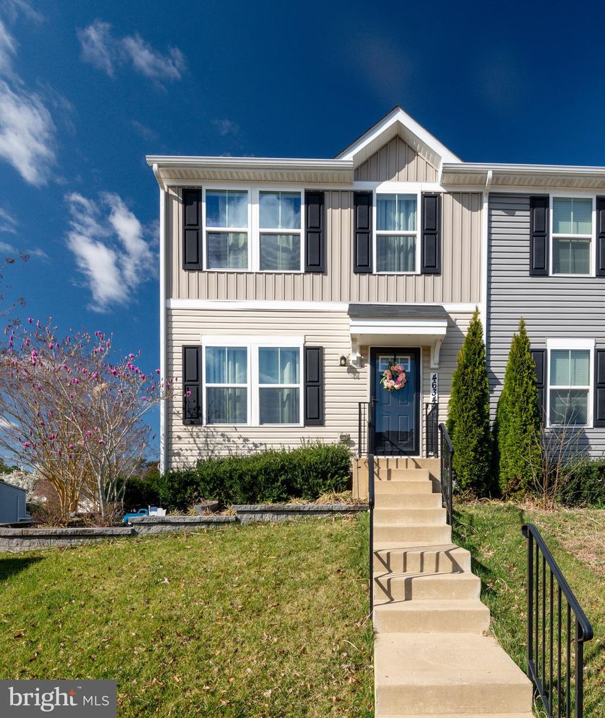 Discover the perfect blend of elegance and convenience in this pristine 3-bedroom, 2.5-bathroom END UNIT townhome. A single-owner 2018 build, it's just steps from Patuxent Naval Air Station, with shopping and dining minutes away.

Step inside to an open concept main level with stylish LVP flooring, a chic half bath, and ample storage. The heart of the home is the oversized eat-in kitchen with an island, stainless appliances, and sliding doors that lead to a deck, a patio, and a large fenced-in yard.

Upstairs, the plush carpeting adds warmth and comfort to three bedrooms, including a primary suite with a private bath and walk-in closet. The laundry is conveniently located upstairs, adding to the thoughtful design.

An unfinished basement is roughed in for a full bath offering potential for expansion. The home is wired for ADT security and Verizon FIOS. A well-maintained exterior with a retaining wall and buried downspouts ensures curb appeal.

Schedule your showing today to experience the blend of modern living and prime location in this must-see townhome!