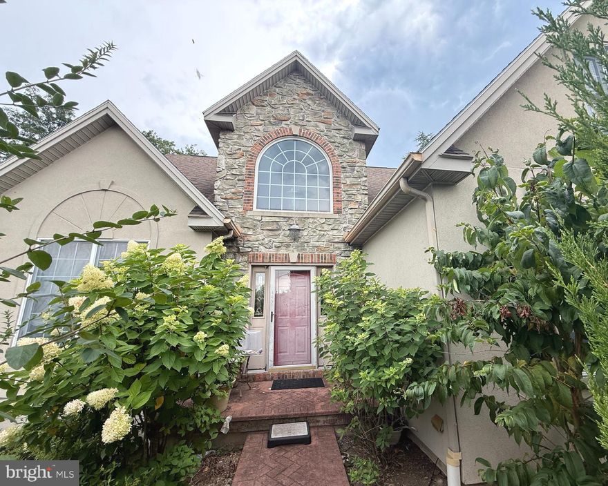 Welcome to this two story traditional home in Beacon Hill with so much opportunity!  The home has lovely curb appeal with its stone and brick accents and winding brick walkway which leads to your front door.  The two story foyer makes a statement as you walk inside the home as does the bridge overlooking the two story family room. On the first floor is a formal dining room, eat-in kitchen, family room with vaulted ceilings,  and a primary bedroom suite with large corner soaking tub.  Right off the kitchen are steps to an elevated, multi-tiered sunroom that overlooks your semi-private and beautiful backyard with a patio. There are two more bedrooms and another bathroom on the second floor, plus a spacious walk out basement with another full bathroom. Situated on a corner lot, this home has  a side entry garage plus a private paved driveway. Conveniently located close to the PA Turnpike, Routes 83, & 581 and a short drive to the East Shore, this home just needs some TLC to bring it back to life!