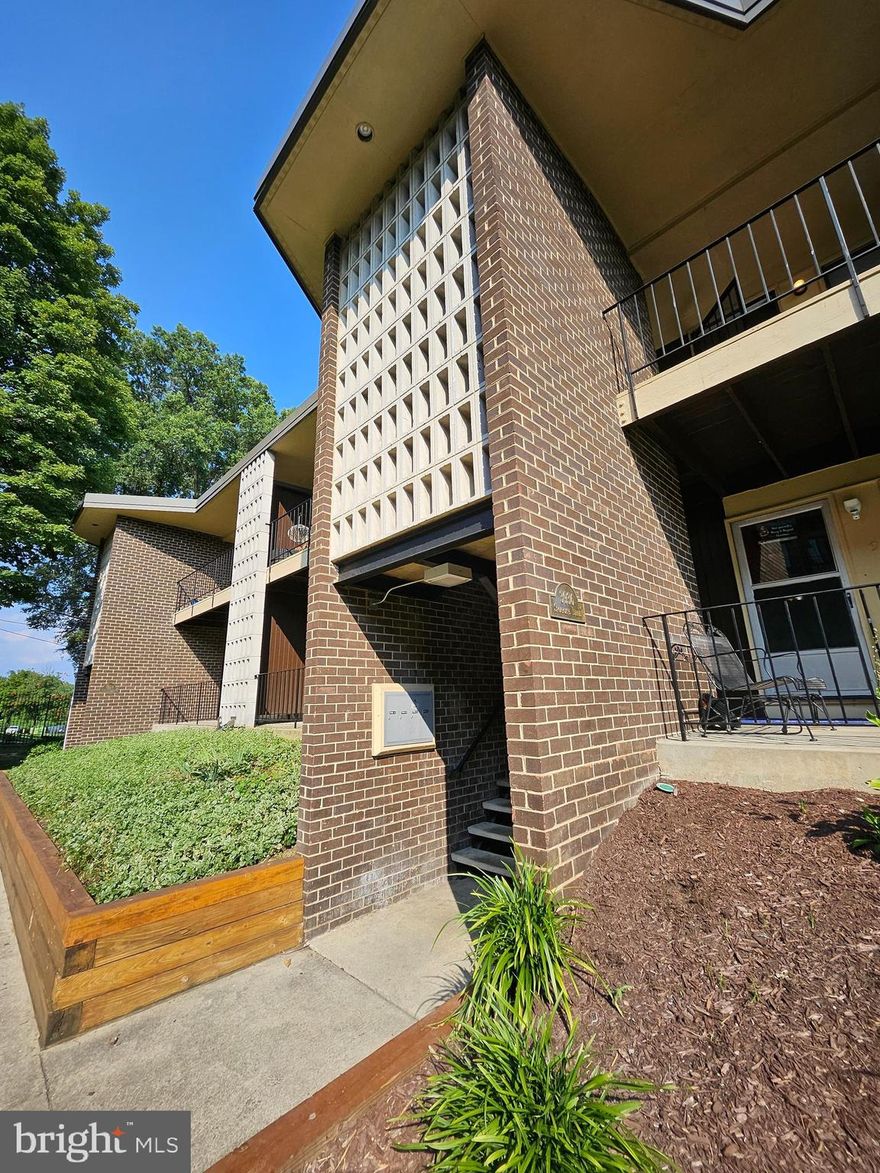 This beautifully updated top-floor 2-bedroom, 1-bath unit features wood floors, new carpet, and two patios, including a second deck off the bedroom. The kitchen is modern and the spacious, open main area offers plenty of living space with a separate dining area. Both bedrooms are generously sized, and the bathroom is bright and refreshed. Conveniently located near the DC line and public transportation. Easy application process!