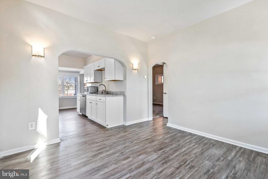 Charming fully renovated cape cod with open floor plan! This home has be upgraded throughout. Luxury vinyl floors, white kitchen with stainless appliances, and new bathroom. Driveway has been repaved, new exterior concrete, water heater, roof, sheathing and vents. This home sits on a large level lot perfect for outdoor entertaining!