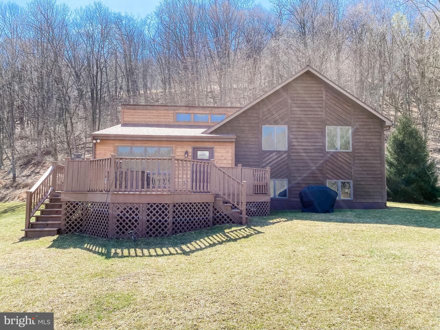 Wow! One step through the front door and you'll be speechless! This light & airy 3 bed 2 bath split level is impressive! Featuring spacious rooms, two decks, stainless steel appliances, central ac, HUGE lower level family room with propane fireplace, 1.19 acre lot, and SO MUCH MORE! You'll LOVE the view! Don't miss this one!