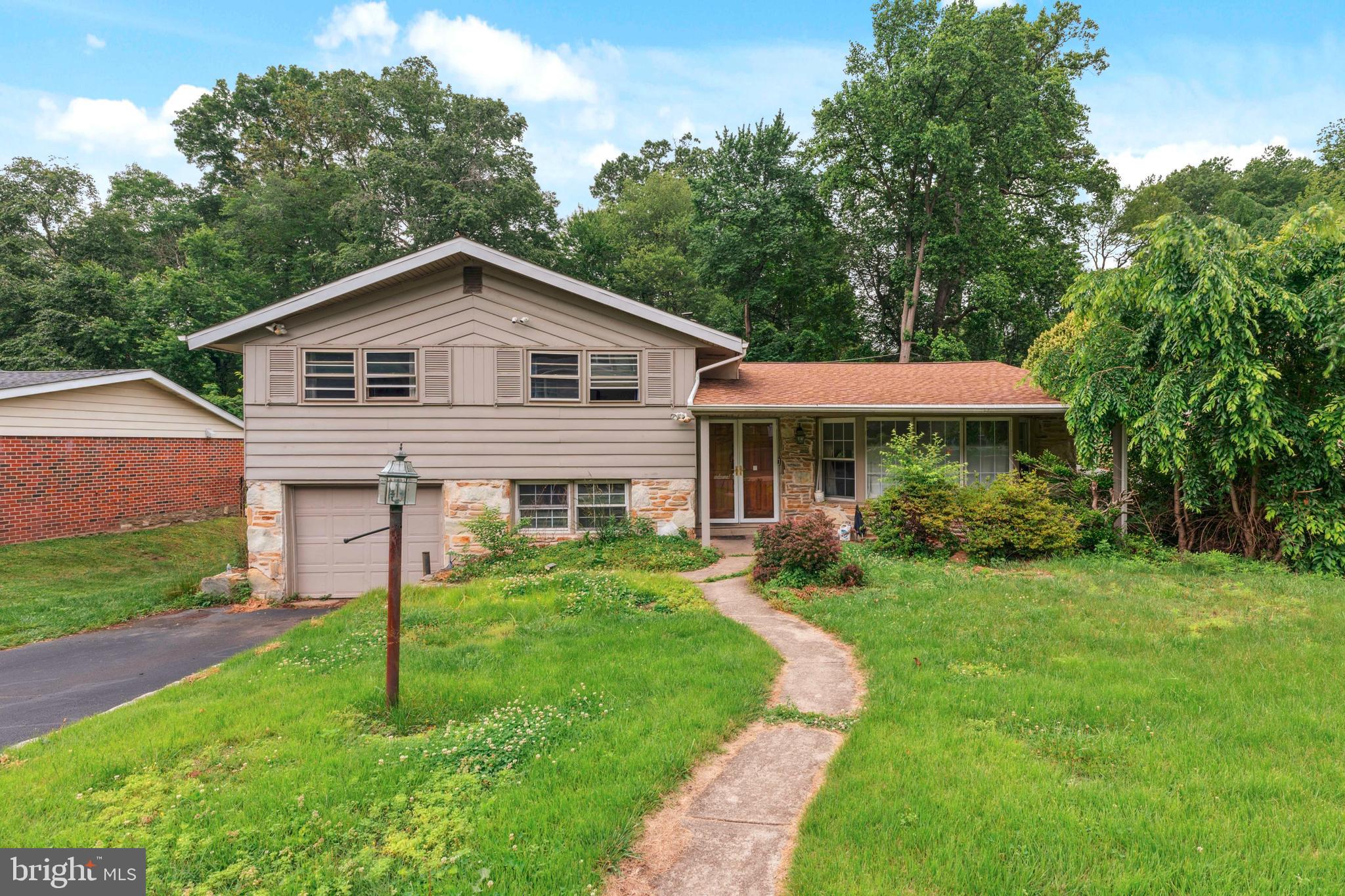 Tucked away in a desirable Huntingdon Valley neighborhood, this spacious residence offers a unique opportunity to create the home you’ve always envisioned. With just the right finishing touches, this gem can truly shine.
Step through the welcoming foyer into a bright and airy sunken living room, where hardwood floors and a triple-panel bay window beneath a vaulted ceiling fill the space with warmth and natural light. The adjacent formal dining room also features soaring ceilings and overlooks the private backyard, setting the perfect tone for entertaining or holiday gatherings.
The generously sized eat-in kitchen provides a versatile layout and serves as the perfect canvas to bring your culinary dreams to life. A few steps down, the cozy den opens to the backyard through expansive 10-foot sliding glass doors, offering a seamless transition to the patio, an ideal setting for outdoor entertaining or quiet moments in the fresh air.
This level also includes a convenient powder room, a large laundry/mudroom, and direct access to the attached one-car garage.
Upstairs, retreat to the spacious primary suite, complete with a walk-in closet and private bath. Three additional bedrooms offer comfortable accommodations and share a full hall bath with a double vanity, perfect for family or guests.
Whether you're looking to personalize or invest, this well-located home offers endless possibilities. With its great layout, natural light, and fantastic bones, this is your chance to craft a true dream home in a wonderful community.