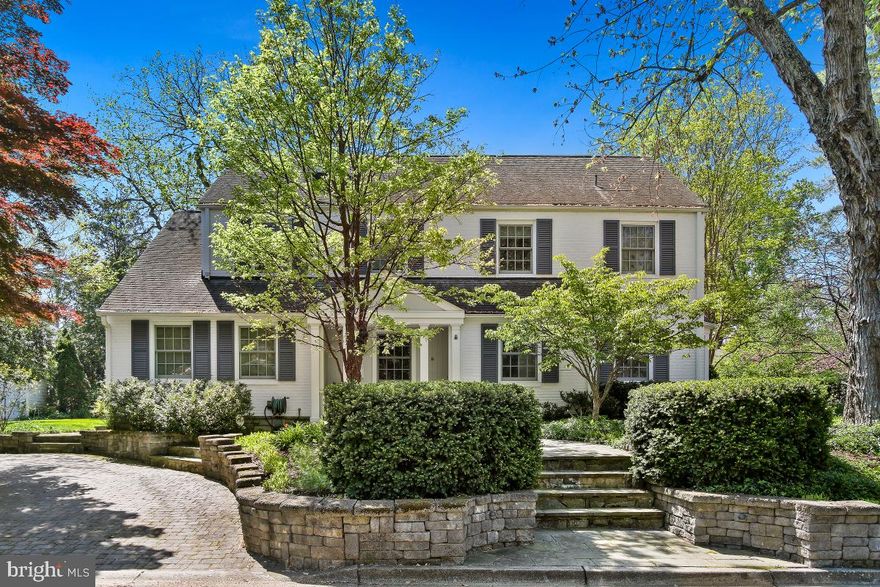 Beautifully Renovated and Expanded Colonial with four bedrooms, three full baths, and two half baths.  Located in the highly desirable Bradmoor neighborhood, this stately home offers a paved driveway and front courtyard accented with professional landscaping. Inside the front door, you are welcomed into the living room complete with a wood-burning fireplace and a spacious formal dining room with an oversized bay window and beautiful garden views. The chef-inspired kitchen includes a Thermador range, Wall Oven, Subzero refrigerator, and a GE Advantium Speed Oven. The Kitchen opens to the family room complete with custom built-ins and French doors to the back patio. There is also an office with pocket doors for extra privacy on the main level. Upstairs is the primary suite with a walk-in closet, and luxurious en-suite bath.  There is a second bedroom with an en-suite bath and access to the walk-up attic that includes a cedar closet. There are two additional bedrooms and a hall bath on this level. The Basement of this house offers another office space and conference/ game room,  with a gas fireplace, wet bar, and wine cooler. The basement also includes a half bath, laundry room, work room, and additional storage.  8403 Irvington is a must-see, move-in ready home located just a short distance to downtown Bethesda, NIH, and 495.