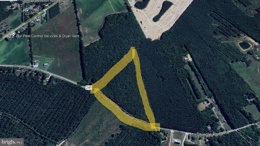 Approximately 8.4 acres located just outside of Milton with development potential. Water, Sewer, and Natural Gas MAY BE available to the site in the near future, but is well and septic now.  This property has road frontage on Shingle Point Road.  It is mostly wooded and has some preliminary engineering done.
