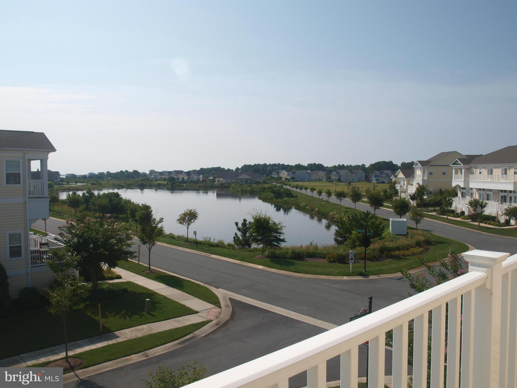 APPROVED LIST PRICE! GET IT WHILE IT'S STILL HOT! Tranquil community located min. from Ocean City and Assateague Island. 4BR/3FB/1HB unit w/welcoming feel; LR hardwood floor with FP near kitchen; TWO (2) MASTER BEDROOMS/FULL BATHS (one (1) w/ private balcony w/view to lake, community center), amenities incl. pool, tennis courts, and clubhouse. LA is EXP'D ATTORNEY & SHORT SALE NEGOTIATOR