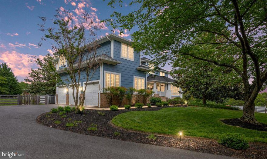 Welcome to your dream home in Glenelg Manor Estates! This one-of-a-kind, thoughtfully remodeled, Craftsman offers the perfect blend of character, comfort and modern convenience — all set on a stunning 4.15 acre lot in sought-after Howard County. With nearly 5,000 square feet above grade, and an additional 2,200 square feet in the finished walkout lower level, there’s room for everyone and everything. Upon arrival, you’ll notice meticulous attention to detail — from the Hardie Plank Siding and brick walkways, to the professionally landscaped lighted grounds featuring expansive pastoral views. Enjoy quiet mornings or relaxing summer evenings on the Trex-style deck, or stone-floored screened-in porch, both overlooking the custom heated 20x40' saltwater pool. The pool features wide custom steps, surrounded by elegant brick pavers and white vinyl fencing. A separate fenced-in area nearby is ideal for pets. Inside, this 5-bedroom 4.5-bath home is filled with charm and upscale touches. The welcoming foyer greets you with stained-glass windows, high ceilings and beautiful Craftsman railings. Hand-honed hickory floors run throughout much of the main level, adding warmth and timeless style. The heart of the home — the kitchen — has been fully remodeled with warm white cabinetry, soft-close drawers, natural quartzite counters, a walnut crowned center island and large walk-in pantry with custom built-ins. A high-end GE Monogram propane range and stainless-steel appliances complete the space. The breakfast area adjoins the screened-in porch, making indoor-outdoor entertaining seamless. Just off the kitchen, a practical mudroom with hooks and storage keeps everything organized. Stepping down into the family room you’ll encounter built-in shelving, a wood-burning fireplace and coffered ceilings — perfect for movie nights or cozy weekends. A private office with built-ins and a large closet, a sunroom flooded with natural light, a formal living room complete with propane fireplace, and a stylish powder room with ceramic flooring and black fixtures, completes the main level. Upstairs, the Primary Suite is a true retreat — spacious and serene with hand-honed hickory flooring, custom trim, casement windows, a large custom walk-in closet and a spa-like, remodeled primary bath, featuring a freestanding soaking tub, tiled shower stall and dual vanities. A private, second-ensuite bedroom includes a sliding glass door and Juliet balcony. Two additional bedrooms share a remodeled Jack-and-Jill bath, while a flex space is perfect as a playroom, study, or additional bedroom. Rounding out the 2nd level, currently serving as a craft area with stainless-steel wash basin, this room is plumbed and ready for a second washer and dryer, if desired. The expansive walkout lower level offers a haven for recreation, hobbies and entertainment, complete with built-ins, a large open area for games, and plumbing for a future bar or kitchenette. This level also features a dedicated workout room, an activity room, utility space and laundry area, two AO Smith propane water heaters, water treatment and radon mitigation systems, a dual zone propane heating system and two electrical subpanels. Storage abounds throughout, with large walk-in closets and custom built-ins. Additional highlights include multiple ceiling fans, built-in speakers, a 2nd/rear staircase to the kitchen and custom window treatments, featuring plantation shutters and shades. This extraordinary home seamlessly blends classic Craftsman charm with thoughtful, modern updates — all in a peaceful, picturesque setting. Whether you're hosting gatherings, enjoying quiet moments by the pool, or simply soaking in the serene views, every detail has been designed for your comfort and livability. Truly move-in ready and rich with character, this is a rare opportunity to own a standout property— a home you don’t want to miss!