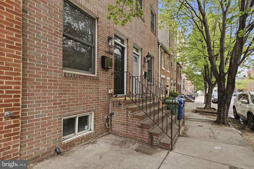 Nestled in the heart of Baltimore’s vibrant Locust Point neighborhood, 1344 Towson St is a true gem—blending modern living with classic charm.

Step inside and you’re immediately greeted by high ceilings and an open, airy living space. Kick off your shoes and hang up your coat in the large, convenient storage closet right on the main level. As you move into the separate dining area, you’ll find an updated kitchen featuring fresh white cabinetry, stainless steel appliances, granite countertops, a spacious breakfast bar, and a standalone island—an ideal setup for everyday living and entertaining, and a true luxury for city rowhomes. Just off the kitchen, enjoy access to your private patio—perfect for grilling or letting the pup out. A main-level powder room rounds out the first floor, offering added convenience for guests.

On the second floor, you’ll find a spacious rear bedroom with its own ensuite bathroom and private balcony. At the front of the home, there’s another generously sized bedroom with its own ensuite—creating a functional and flexible layout. This level also includes a dedicated laundry room with additional storage.

The entire third floor is your private primary suite oasis, featuring a large bedroom, two walk-in closets, and a spacious bathroom with a soaking tub, dual vanities, and a separate glass-enclosed shower. From this level, you’ll also have access to a massive rooftop deck with beautiful water and city views.

And there’s more—the fully finished, freshly painted basement offers incredible versatility. Whether you need a media room, home gym, office, or guest suite, this space can do it all—complete with its own full bathroom.

The location is unbeatable—just steps from the waterfront, parks, and some of Baltimore’s best dining, coffee shops, and local boutiques. With easy access to I-95 and major commuter routes, this home offers the perfect balance of city energy and everyday convenience.

Don’t miss your chance to call 1344 Towson St home. Schedule your tour today and experience the best of Baltimore living.