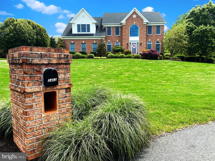 VIRTUAL TOUR  https://my.matterport.com/show/?m=x6y81mgXUTG&mls=1WOW!  CLASSIC BRICK FRONT CENTER HALL COLONIAL ON 1.72 BEAUTIFULLY LANDSCAPED ACRES AT THE HEAD OF A CUL DE SAC IN FALLSTON!  EXTERIOR FEATURES INCLUDE A MAINTENANCE FREE DECK, FABULOUS FLAT FENCED YARD, SHED, MAGNIFICENT LANDSCAPING AND A 2 CAR SIDE LOAD GARAGE. SPREAD OUT IN THIS SPACIOUS HOME WHICH FEATURES 3314 FINISHED sq. ft.  ON THE UPPER 2 LEVELS, PLUS AN ADDITIONAL 175 sq. ft.  CUSTOM, FULLY INSULATED THREE SEASON ROOM (simply add a baseboard heater and you have year round use!), PLUS A FINISHED LOWER LEVEL, FOR A TOTAL OF APPROX  5000 FINISHED sq. ft!  THE MANY UPDATES TO THIS FABULOUS HOME INCLUDE AN ARCHITECTURAL SHINGLE ROOF (2012), CONVERSION FROM OIL HEAT TO PROPANE GAS HEAT WITH NEW TRANE HVAC (2017), AND A REMODELED GOURMET KITCHEN (2012) WITH GRANITE COUNTERS, TRAVERTINE TILE FLOORS, SOFT CLOSE CABINETS, & STAINLESS-STEEL APPLIANCES (including a 5 Burner GAS cooktop, 2 wall ovens, a beverage cooler).THE FOCAL POINT OF THE DRAMATIC TWO- STORY FAMILY ROOM IS THE GAS FIREPLACE WITH MANTLE.  THE 2 STORY FOYER, FORMAL LIVING ROOM, FORMAL DINING ROOM, AND OFFICE (all with hardwood floors), AND FULL BATH COMPLETE THE MAIN LEVEL.   IN ADDITION TO 4 BEDROOMS (all with ceiling fans) & 2 FULL BATHS IN THE UPPER LEVEL, THERE IS A HANDY BUILT IN STORAGE AREA IN THE UPPER LEVEL LANDING.  THE MASTER SUITE FEATURES A SITTING ROOM, SPA BATH WITH SOAKING TUB AND SEPARATE SHOWER, & 2 CLOSETS (ONE IS WALK-IN) THE FULLY FINISHED LOWER LEVEL CLUB ROOM HAS AN AREA FOR TV & MOVIES AND A POOL ROOM AREA.  THERE IS AN ADDITIONAL  MAN CAVE  ROOM (possible bedroom).  THERE IS ALSO A STORAGE ROOM AND A WALK-UP EXIT.