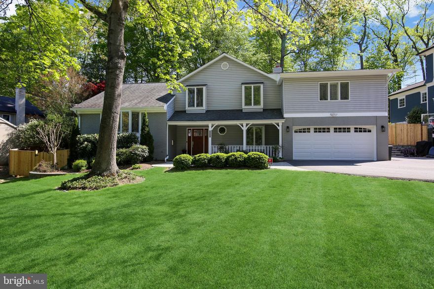 Welcome to this incredibly spacious five level contemporary home located in the coveted Whitman school district.  Featuring four bedrooms, three full baths, one half bath, an open-concept floor plan, two car garage and an expansive fenced yard, this light-filled home has so much to offer!  The inviting front porch leads to a welcoming foyer. To the right is a terrific mud room featuring custom built-ins and also providing access to the oversized two car garage.  Additionally, you’ll find a convenient laundry room with great closet storage, a tasteful utility sink, and a beautifully updated powder room.  Continue through the foyer to find a wonderful family room complete with a wood-burning fireplace and french doors leading to a flagstone patio, perfect for entertaining.  Travel up to the next level where you’ll find an amazing gourmet kitchen, complete with stainless steel appliances, silestone counters and tons of cabinetry for great storage.  There’s a separate breakfast area with doors leading to a low-maintenance Trex deck.  The kitchen is also open to a formal dining room and an elegant living room with a bright bay window.    Continue to the bedroom level and discover a gorgeous expanded owner’s suite with vaulted ceilings, a huge walk-in closet and a luxurious bath featuring a dual vanity, quartzite countertops, designer tile and lighting, an oversized shower stall and a separate air jet soaking tub.  There’s an additional en-suite bedroom on this level with a tastefully renovated bath, as well as two additional bedrooms and a third beautifully renovated hall bath.  All bedrooms feature new hardwood floors.  Downstairs you’ll find great space to utilize as a home gym or recreation room, as well as an awesome walk-in pantry for additional storage.  There’s also a private home office/flex space, with an adjacent exterior door ideal for easy client access.    The current owners have invested in many property upgrades and have created a turn-key home with a breathtaking lot, in superb move-in condition.  Ideally located just moments from downtown Bethesda, countless parks and trails, shopping, dining and other entertainment, and in a private and quiet neighborhood, this home is the perfect 10!