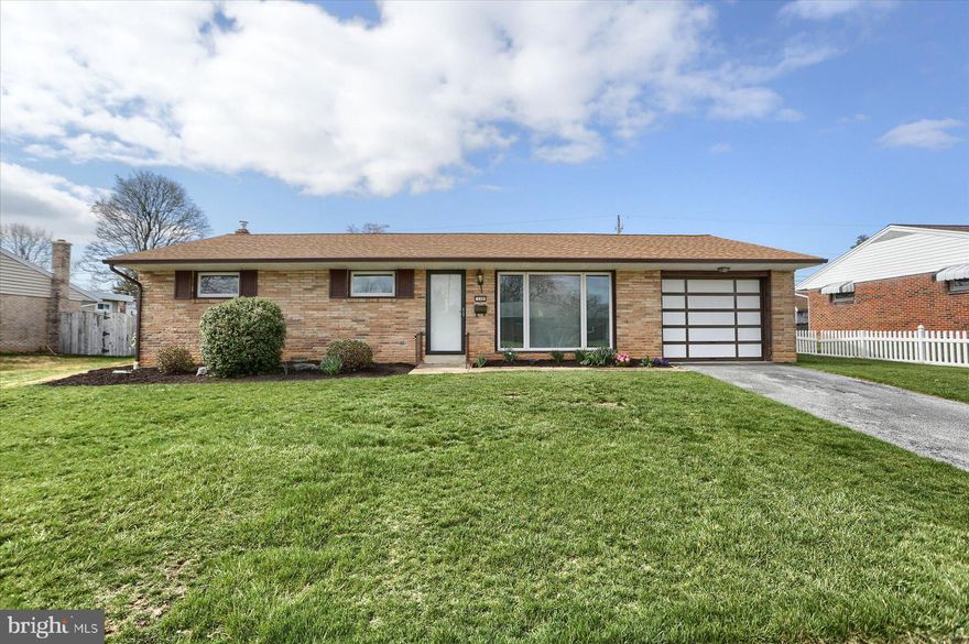 Welome to this charming brick ranch home in Windsor Park.  Featuring a unique sunken living room. Dining Room opens to kitchen and living room. All appliances included. Beautiful hardwood floors, updated carpeting. The sunroom provides a peaceful retreat with natural light pouring in, creating the perfect spot for morning coffee or evening relaxation. The home sits on a level yard with a patio, offering plenty of space for outdoor activities or gardening. Three bedrooms and full bath on main level. Primary bedroom also includes a half bath. Roof recently updated in 2020. Basement provides plenty of storage.  One car garage and off street parking. Convenient location close to shopping, dining, Rt 15 and the Turnpike.