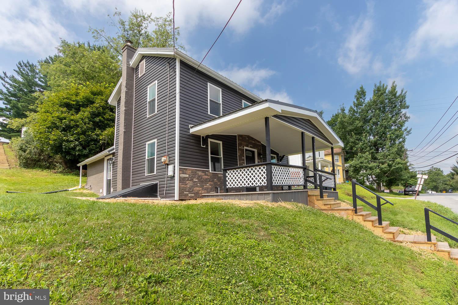 Oh baby, this is *the ONE*! Step inside this beautifully renovated 3-bedroom, 1-bath home that's ready for your furniture and your family to make it complete. The charming front porch offers a bird’s-eye view of Philipsburg, the perfect place to sip your morning coffee or unwind at the end of the day. Inside, you'll be welcomed by warm, inviting tones, durable vinyl flooring, and a light-filled open floor plan. The spacious living and dining areas are ideal for gatherings and everyday living. The kitchen is a true showstopper, featuring sleek stainless steel appliances, gorgeous wood countertops, and a generous amount of cabinetry that will have you dreaming of family dinners and cozy weekends at home. A full bathroom adorned with beautiful stone tile, plus a convenient first-floor laundry and mudroom area, round out the main level. Upstairs, you'll find fresh new carpeting and three comfortably sized bedrooms, a peaceful retreat after a long day. With all the updates already done, there's nothing left to do but move in and enjoy! Hot on the market! Don’t miss your chance to make this one yours!