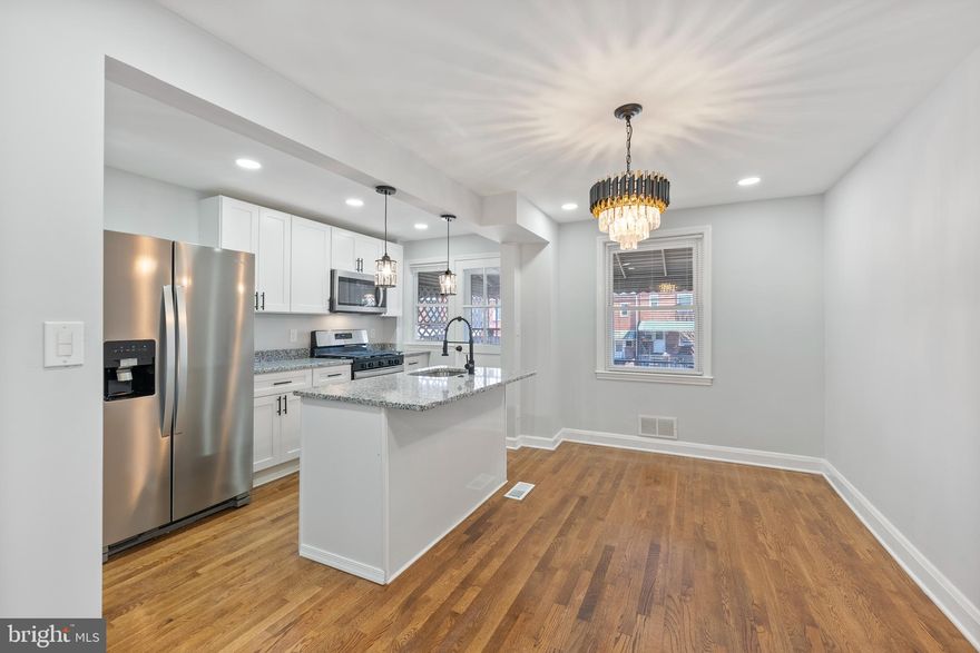 Back on the market! The buyer was unable to secure financing, so their loss is your gain!   All inspection repairs were completed and the home appraised at or above list price.    
Welcome to 4120 Gladden Ave, where modern updates meet timeless charm—all at a newly reduced price! This fully renovated 3-bedroom, 2-bathroom home is packed with upgrades, including brand-new mechanicals: new HVAC, central A/C, updated plumbing, and all-new windows for worry-free living.

Inside, enjoy gorgeous hardwood floors, recessed lighting, and a beautifully designed kitchen with granite countertops, a spacious island, and stainless steel appliances. The open kitchen and dining area offer the perfect entertaining space, while the separate living room provides a cozy retreat.

The fully finished basement adds even more versatility with a bonus room and a second full bathroom, perfect for a fourth bedroom, office, or family space.

Outdoor living is a dream! Enjoy the covered front porch—perfect for morning coffee—and step onto the back porch patio, an ideal spot for grilling, dining, and relaxing as the warmer weather arrives. The spacious backyard completes the picture for outdoor fun.

With brand-new mechanicals, stylish finishes, and thoughtful upgrades throughout, 4120 Gladden Ave is the perfect place to call home. Schedule your showing today and take advantage of this incredible price reduction!

This home is also eligible for Live Baltimore’s Buy Back the Block Grant offering up to $20,000 in closing costs to eligible renters & a ton of other Down Payment Assistance Programs! Contact me to learn more.