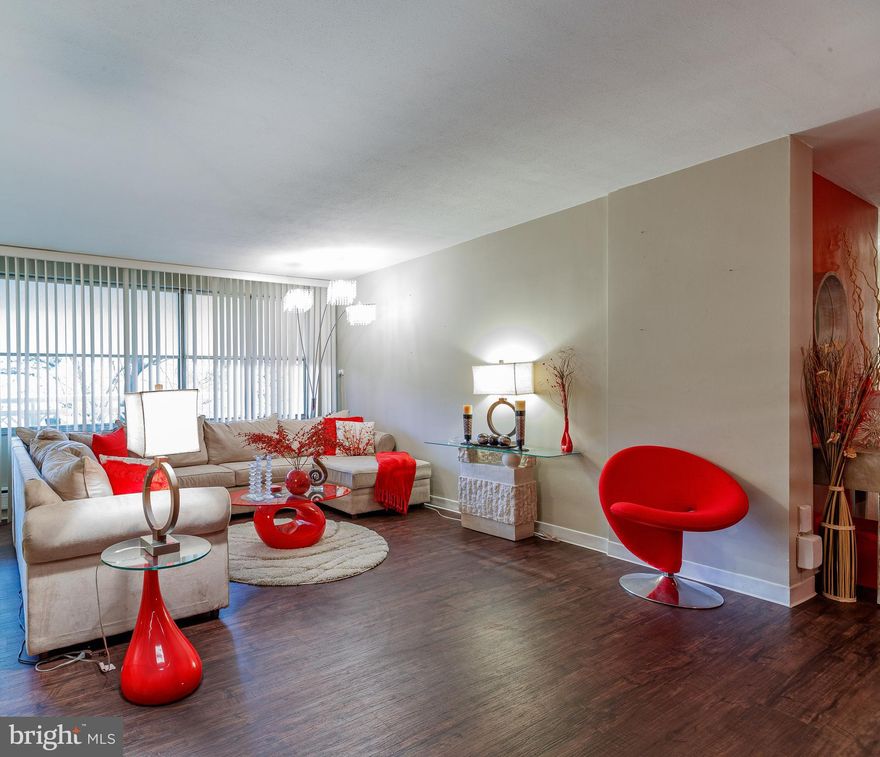 Welcome to this stunning and tastefully furnished condo that effortlessly combines elegance and comfort. As you step inside, you'll be greeted by an open living space, adorned with beautiful wood floors that create a warm and inviting atmosphere. The living area not only boasts a cozy ambiance but also features a bar, perfect for entertaining guests. The adjacent dining area is ideal for enjoying meals with loved ones. The galley kitchen is equipped stainless steel appliances. With two bedrooms, you have the option to retreat to the spacious bedroom, offering tranquility and relaxation, or indulge in the large primary bedroom that boasts a walk-in closet and an ensuite. An additional bathroom ensures convenience for both residents and guests. Step outside onto the patio, a serene oasis with plenty of space for outdoor living and creating beautiful memories. This condo is available for sale fully furnished, allowing for a turnkey and hassle-free living experience.