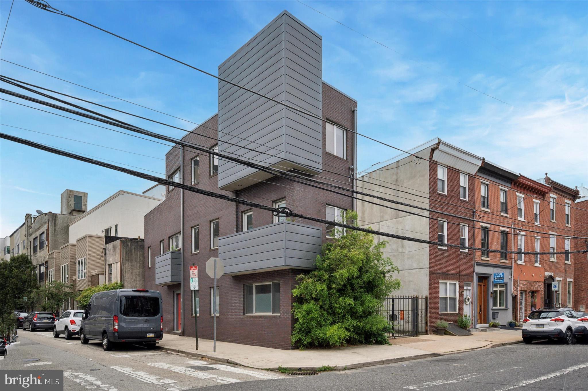 Located in the heart of Northern Liberties, this modern townhome is situated on a corner, offering an abundance of windows and natural light. Enter into the main level, where you'll find your living and dining space. A chef's kitchen with a full suite of stainless steel appliances, gas cooking, tiger cabinetry, island counter offering great space for entertaining. A separate living room with high ceilings, easily accommodating large furniture. Downstairs, a finished basement offers additional den or office space, storage, and laundry room. Take the stairs up to your second floor to find two spacious bedrooms, a juliet balcony, and a contemporary hall bath, the first of two full baths, with generously proportioned deep soaking tub. On the third floor, find a sun-splashed, generously proportioned primary suite with vaulted ceiling, excellent closet space and en-suite full bath with elegant walk-in shower and dual sinks with excellent storage space, completed by a skylight to fill the space with natural light. Additionally on this floor is a peaceful roofdeck, to enjoy your morning coffee or relax outside to wind down into the evening. This home was architecturally designed to maximize the use of light and space. Available for anytime in August move in or September 1st. No pets, no smoking. Tenants are responsible for all utilities including water based on usage. Located steps to all of the fantastic restaurants and cafes Northern Liberties has to offer - find acclaimed restaurants and chefs at nearby Pietramala, Yanaga Kappo Izakaya, Standard Tap, North Third, all within just a 2 block radius! Local favorites Joy Cafe, CNT Coffee and Tea, Higher Grounds, and Dolce Caffe offer morning coffee just down the street. Local markets such as Palm Tree and Three J's offer convenience, and a brand new Sprouts grocery store is a wonderful addition to the neighborhood. Walk just a block to City Fitness and other fitness studios nearby. A quick two block walk to the Market Frankford line offers a quick ride to downtown, no need for a car here. This wonderful neighborhood has it all!