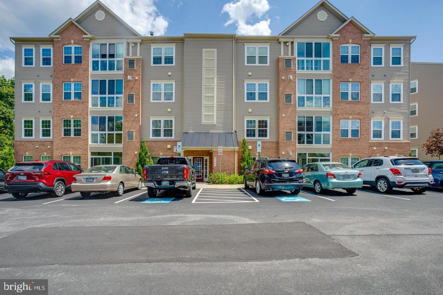 Welcome Home! This 55+ unit gives you the modern amenities, safety and security, and the peace of mind you deserve. Two bedrooms and two baths complimented by an open floor plan. The kitchen offers beautiful black appliances and a neutral palette as well as private use full size washer and dryer tucked out of the way in a closet. There is also a breakfast bar pass through window for additional seating or easy catering. Adjacent dining area well proportioned for multiple guests and open to the living room for easy entertaining and a flex space currently used as an office. The home faces a preserve area for privacy and offers a four-seasons room to enjoy the outdoors year round. It's good to be home! Building is accessible by security door entry. Landlord will provide building access. Refrain from using the bathrooms.