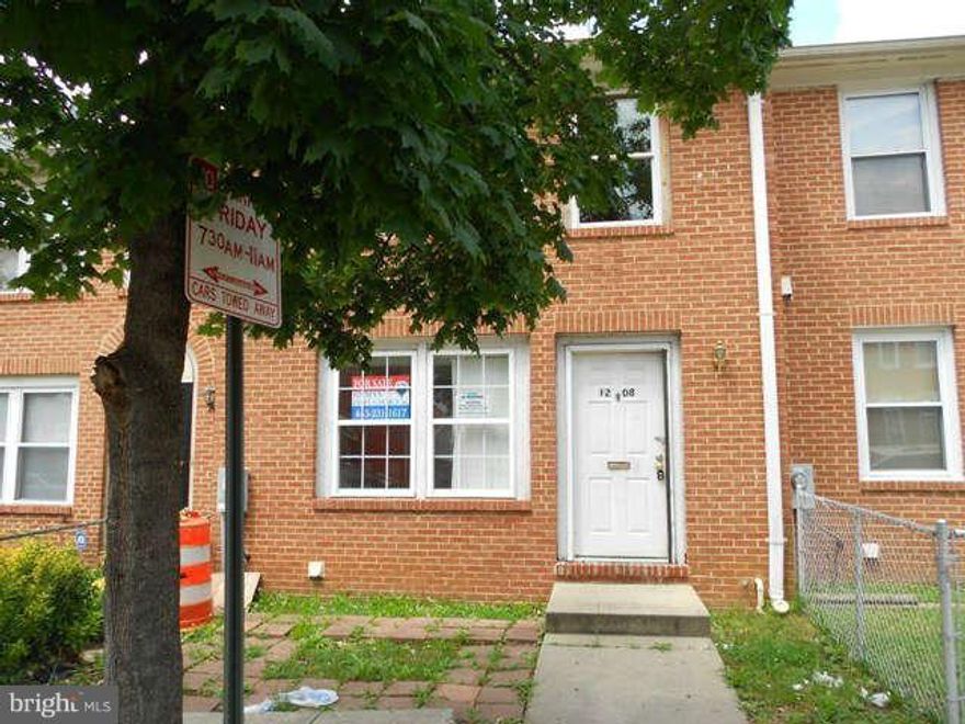 RUN - Don't Walk to this Gorgeous Townhouse built in 1984 and Remodeled in 2013 *** three bedroom one full bath townhome with eat in kitchen, new carpeting, deck, large basement, alarm system, back yard, washer and dryer. Within 1.5 miles from downtown baltimore, MICA, Mercy Hospital, Hopkins Main Campus, and MTA.  Hurry this one won't last!!!