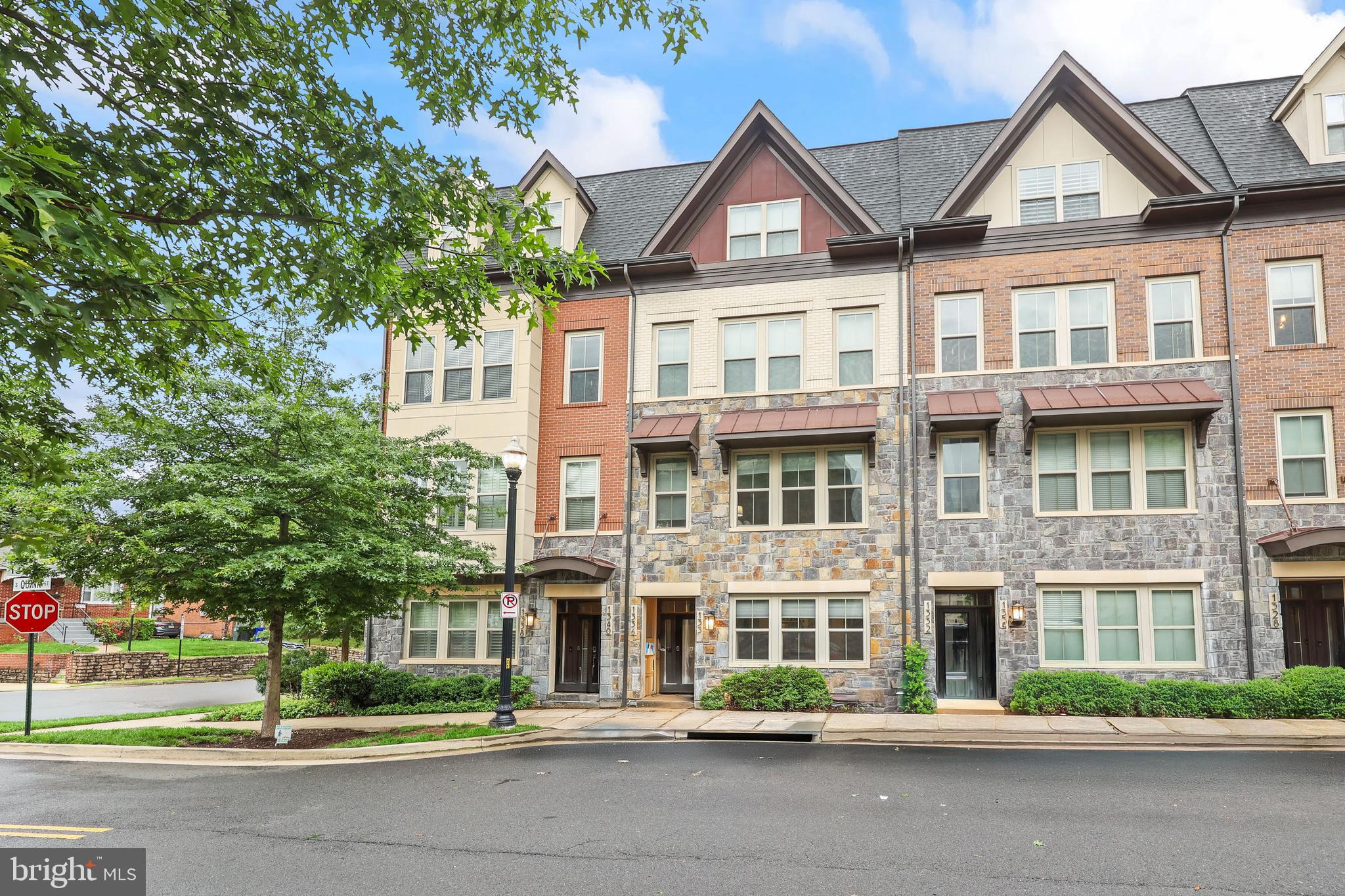 Welcome to 1334 S Quinn Street—a stunning 3-level townhome condo in Arlington’s sought-after Carver Place community. Offering the perfect blend of sleek design, flexible living spaces, and unbeatable convenience, this home is your gateway to the best of Northern Virginia and D.C. living.
Just minutes from the Pentagon, Amazon HQ2, and downtown D.C., the location is truly unmatched. Whether you're commuting, traveling, or exploring, you’re always connected—yet nestled in a quiet, well-maintained enclave that feels like home.
Inside, clean lines and soaring ceilings complement the open-concept layout, with rich hardwood floors and natural light throughout. The gourmet kitchen features a spacious island that seats four comfortably—ideal for morning coffee, hosting friends, or remote work. A main-level powder room adds convenience.
Upstairs, you'll find three spacious bedrooms and two full baths, including a luxe primary suite with a walk-in closet and spa-like ensuite. The lower-level rec room—with a full bath—adds flexibility for a guest room, office, gym, or media space.
Energy-efficient systems, smart finishes, and easy access to parks, restaurants, shopping, and commuter routes make this townhome condo a rare find—where style meets substance, and location is everything.