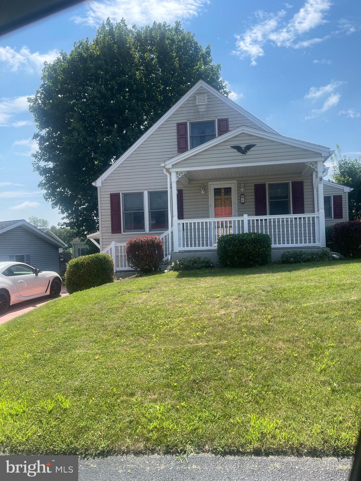 2 HOMES ON 1 DEED! Includes 5 E Center Street which backs up to this property. 6 E Church is a cape cod 2 br, 1 ba property with 2+ off-street parking spots; put a wall up and it would be a 3 br house. Oversided 2-car garage is behind this home and features a covered patio and door to the garage. Driveway access to the garage from the E Center St property. E Center Street is a single story 2 br, 1 ba property. 6 E Church is currently vacant / 5 E Center St is currently rented.