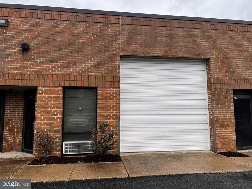 This 1068 square foot raw garage space has all of the potential that you need!! Located in the industrial park in Prince Frederick, MD. The open, unfinished interior offers a blank canvas, allowing you to customize the space to suit your specific business needs—whether it's a workshop, warehouse, distribution hub, or light industrial operation.