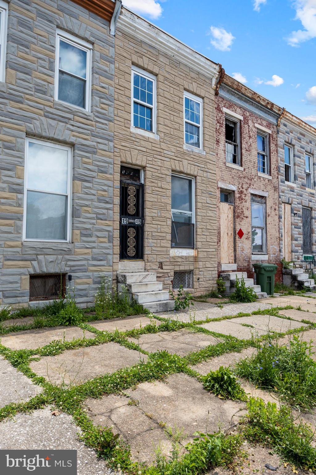 Investor Special: A fully stripped-to-the-studs shell awaiting complete rebuild. This blank-canvas rowhome footprint offers you the chance to craft a modern floorplan, add high-end finishes, and maximize value.