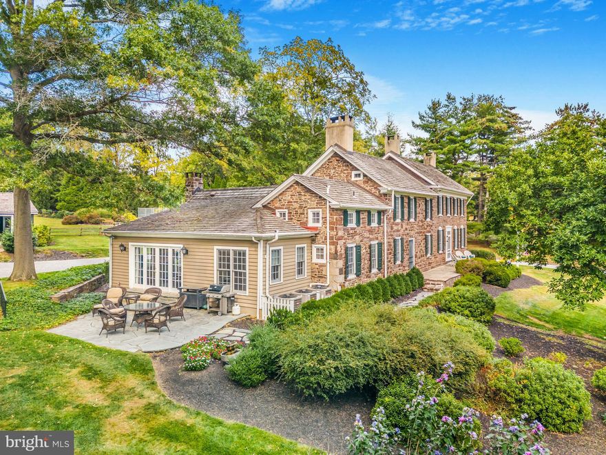 6+ acres within the esteemed landscape of Upper Makefield, 1789 Wrightstown Road presents a rare offering of enduring beauty, provenance, and distinction. Dating to 1752 and proudly listed on the National Register of Historic Places, the Grand Manor holds true historical importance—having once served as a medical hospital for George Washington’s troops during the Revolutionary War. 
Set on 6.3 exquisitely private acres of open fields with a forest border, the property is composed of a restored stone manor house, a refined two-bedroom carriage house offering over 1,800 square feet of living space, and an extraordinary bank barn thoughtfully transformed into a pool house. The bank barn’s upper level features changing rooms, a full bath, a utility room, and a dramatic two-story family space designed for effortless gatherings, celebrations, and everyday enjoyment. The lower level accommodates an oversized two-car garage, with generous storage and a workshop to support both practical needs and refined living.
A naturally formed swimming pool and tennis/sports court create an exceptional resort-like setting, seamlessly integrated into the surrounding landscape. Mature specimen trees, flourishing gardens, and a sweeping meadow frame the residences with an air of timeless grandeur and pastoral elegance—offering privacy, beauty, and a sense of permanence that is difficult to replicate.
Ideally suited for multigenerational living, this estate reflects the highest standard of stewardship and a rare sense of legacy. Whether you envision extended family life, visiting guests, or a distinctive retreat designed for hosting, the property’s thoughtful configuration provides comfort, flexibility, and character throughout. Positioned just moments from Washington Crossing State Park, the canal towpath, and the historic crossing site, the home also enjoys convenient proximity to New Hope, Philadelphia, Princeton, and New York City.
1789 Wrightstown Road is not merely a residence, but a landmark estate where history, luxury, and significance converge—inviting you to experience an exceptional chapter of American heritage in refined, living form.
****The bedroom count reflects 4 bedrooms in the Stone Manor home and 2 bedrooms in the carriage home, The bathrooms reflect 4 full in manor, 2 full n carriage, 1 full in Bank barn, 1 half in Manor, 1 half in carriage .