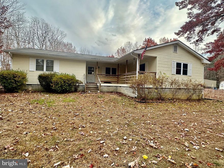 **FANTASTIC INVESTMENT OPPORTUNITY** Rural serenity waits for you on 5 acres! Perfect Opportunity for investment! The bones are great and the location is just perfect.  Main level living with 3 bedrooms, 2 bathrooms, kitchen and family room. Home needs some love but has a lot of potential. 2 Large outbuildings. Home is being sold AS-IS. Perfect location for access to Fredericksburg and Lake Anna, shopping and schools.