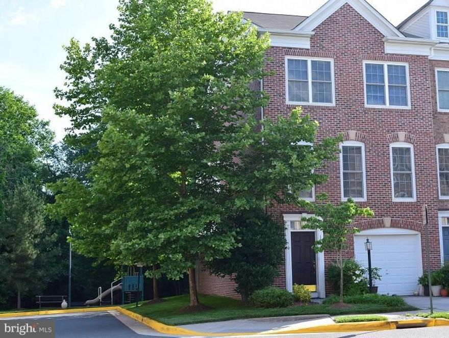 Beautiful 2300 sqft END town home. Hard wood floors, wall to wall window backing to woods. Bright and airy, fireplace, luxury bath, large deck facing the woods, walking trail, walkable to common play area and elementary school. Commuters dream! - close to new Herndon and Reston METRO station, easy access to all major highways and Dulles international airport.