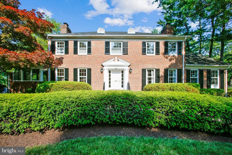 Rarely available in one of Alexandria's most beloved neighborhoods, this stately Georgian colonial is nestled on one half acre with a circular driveway bordered by lush plantings of azaleas, evergreens, and tall trees.  A private in town oasis, this one-of-a-kind home offers  gracious rooms with gleaming hardwood floors and tall windows  which invite formal entertaining or casual gatherings. A curved stairway welcomes you upon entering with a formal living room,  wood burning fireplace and spacious glass enclosed porch for year round enjoyment.   There is a large dining room adjacent to the updated kitchen which leads to a paneled family room with a second wood burning fireplace and bay window. An oversized  sliding glass door provides access to the upper deck overlooking the expansive rear garden. Additionally, there is a handsome paneled library/home office with custom built- ins off the entrance hall and a half bath.   The second floor boasts four bedrooms and two baths with a fifth bedroom located on the lower level which offers space for an au-pair or in-law suite with  bath and large living area with exposed brick, a two sided fireplace. Walk out to a lovely stone patio, level grassy lawn, and your own private pool! This spectacular property offers unlimited opportunities for hosting memorable gatherings, receptions, al fresco dinners and much more.  Additionally, there is a two car garage and room for multiple vehicle parking in two driveways.  Community amenities are in close proximity including Chinquapin Recreation Center, Fort Ward Park, and Bradlee Shopping Center. This wonderful property is also a short drive to Amazon HQ2, the Virginia Tech Innovation campus, the Pentagon,  Ronald Reagan National Airport, Old Town Alexandria,  four high schools, two grocery stores, Starbucks, and much more.