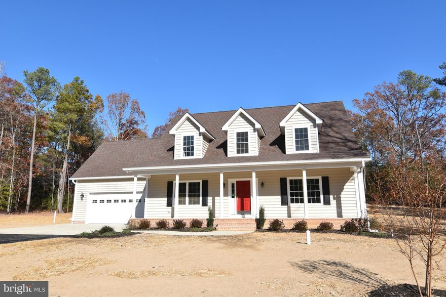 New Cape Cod to be built.  Main level master bedroom suite.  Hardwood floors & Crown molding in great room. Kitchen/dining area will have stainless appliances, hardwood, & granite. # bedrooms & 2 full baths upstairs.  Loft area would make a nice TV room or play room.  Huge front porch.  12 x 14 deck.  24 x 28 garage.  Road maintenance agreement.