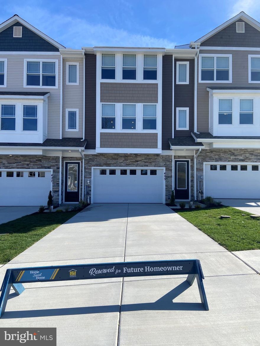 The Fulton is a townhome that seamlessly combines elegance, convenience, and low-maintenance living. With a spacious, light-filled main floor and an upstairs retreat, it’s thoughtfully designed to offer both openness and privacy.

The main living area is bright and inviting, featuring expansive windows that flood the space with natural light. Modern upgrades throughout the home, along with a one-car garage that includes additional storage, make this space as practical as it is stylish. Hosting friends or relaxing with family is easy and enjoyable in such a comfortable, well-designed space.

Upstairs, the Fulton offers a peaceful bedroom retreat, ideal for unwinding. This private space boasts large windows with serene views and room for a cozy reading nook. The generously sized closet and thoughtful layout add to the room's functionality, creating a personal haven for rest and relaxation.