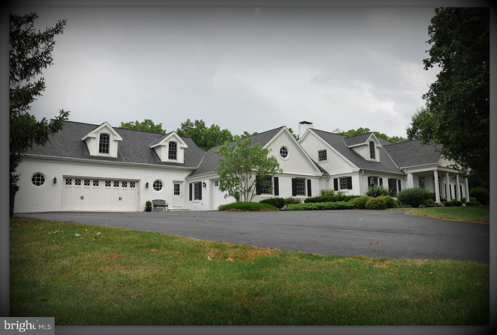 This amazing house sits on a secluded 7.2 acre lot featuring a 1 acre pond & the best that luxury has to offer including oak wood floors, a dream kitchen w/ top of the line appliances & granite counters, master suite w/ stunning marble bath, 3 FP, 4 car garage, breath taking blue stone patio(s), an inviting pool w/ pool house, multiple zoned HVAC, & much more...