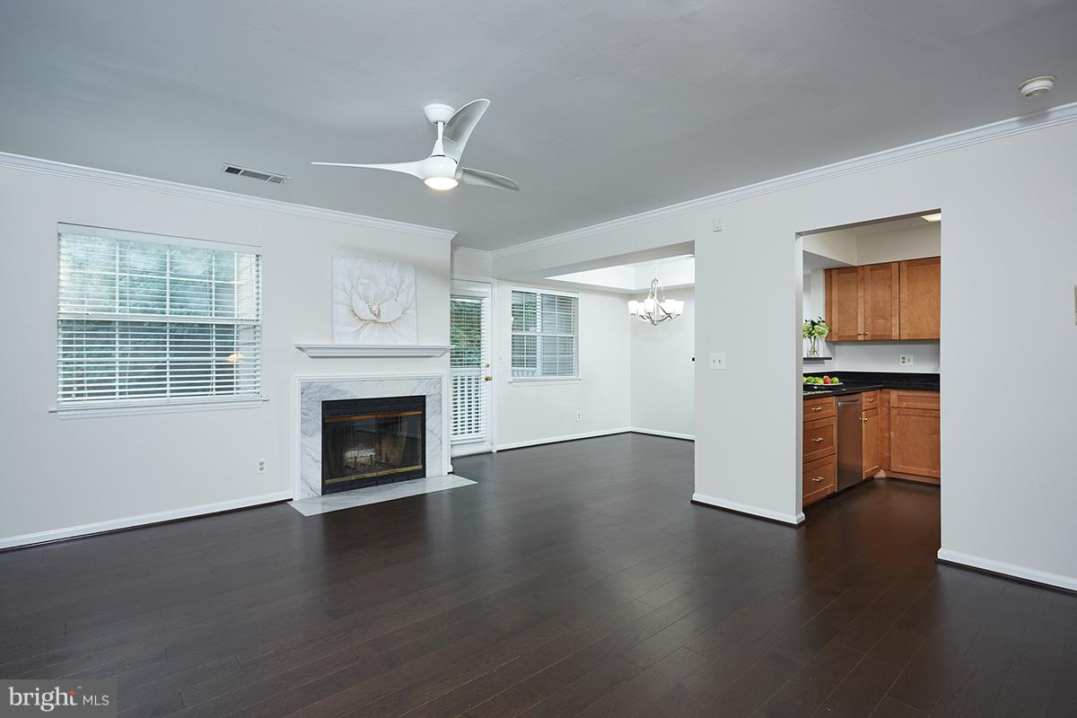 Modern & Stylish Renovated 2BR/2BA Corner Townhome-Style Condo in Prime Location!
Welcome to this beautifully renovated, modern, and chic 2-bedroom, 2-bath corner unit offering the perfect blend of comfort, style, and convenience. This spacious, townhome-style residence features a private entrance with a welcoming patio that leads upstairs to a bright and airy main living area.
Enjoy an open-concept floor plan filled with natural light, accented by rich hardwood floors and stairs throughout. The expansive living room features a fireplace and a private balcony with serene, tree-lined views—perfect for relaxing or entertaining. The living room flows into the separate dining as well as into the fully equipped kitchen, with stainless steel appliances and granite countertops.
Upstairs, you’ll find two generous bedrooms and two beautifully updated full bathrooms. In-unit washer and dryer offer added convenience. Ample free parking is available for residents and guests.
Enjoy access to a wealth of community amenities including a clubhouse with billiards, racquetball court, fitness center, outdoor swimming pool, tennis courts, and pickleball courts.
Located just minutes from I-270, I-495, two Metro stations, Whole Foods, Pike & Rose, Wildwood Shopping Center, and a wide variety of restaurants and shops.
No smoking. No pets. HOC vouchers welcome.