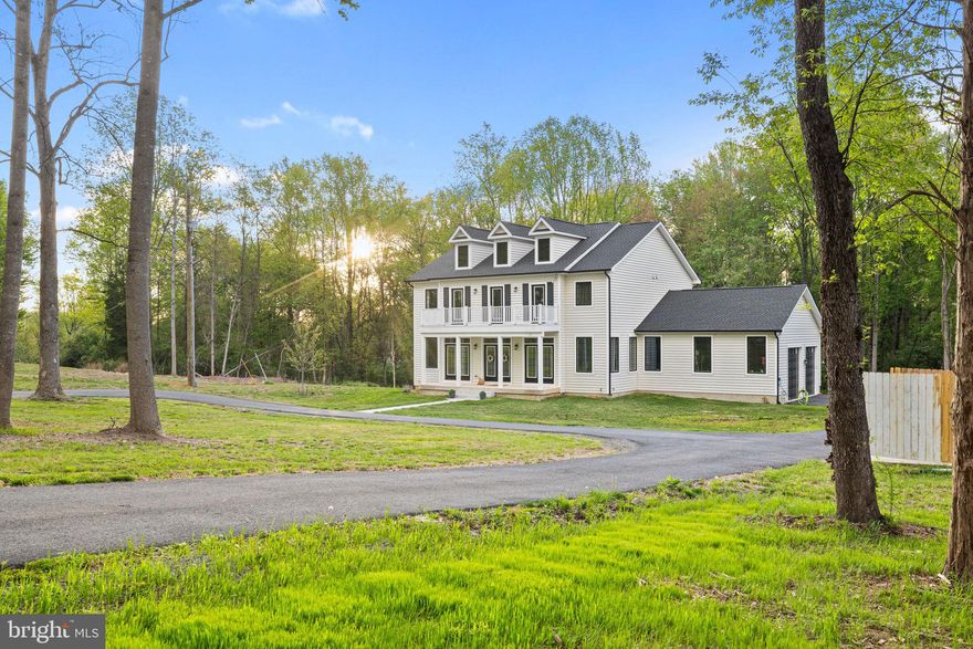 This stunning 4 bedroom, 4.5 bathroom oasis sits on a sprawling 5-acre lot, providing you with plenty of space to spread out and enjoy the tranquility of nature. Step inside and be amazed by the attention to detail throughout this home. 

The fully finished basement offers endless possibilities - a home office, game room, or even a movie theater! And don't worry about power outages, because this home comes equipped with a whole house generator ensuring that your comfort and convenience are never compromised. 

As you explore the main level, you'll notice the beautiful white siding and the striking Anderson 400 windows and doors in black, giving the home a modern yet classic look. The oak stairs with a carpet runner add a touch of elegance and warmth. But the real showstopper is the kitchen. The upgraded cabinets, oversized kitchen island, and 36" gas range and vent make this space a chef's dream. Picture yourself entertaining guests while they gather around the huge granite countertop island, or fill up their water bottles with the water bottle filler with build in chiller in the pantry. And don't forget about the pot filler - no more lugging heavy pots filled with water from the sink! 

The upgraded lighting package throughout the home sets the mood for any occasion. Whether it's fans with lights, recessed lighting, cove lighting, or the sconces on the fireplace, you have the perfect ambiance at your fingertips. And during the holiday season, the convenient holiday light plugs in the eaves make decorating a breeze. No detail has been overlooked, from the solid core doors to the spray foam insulation and full garage insulation, this home has been designed with your comfort in mind. There is a large paved wrap around driveway. The upgraded gutter size with gutter guard ensures that maintenance is a breeze. Even the bathrooms have been given the VIP treatment. Upgraded toilets with comfort height, elongated bowls, and soft-close lids offer a touch of luxury. And with custom tile in each bathroom, your morning routine will feel like a spa getaway. 

The master suite is a true retreat. With a tray ceiling and tray lighting, you'll feel like you're living in a five star hotel. The master shower with 2 separate shower heads and glass surround with custom brackets adds privacy and style. Every aspect of this home has been carefully thought out, including the high quality carpeting with premium padding on the lower level and in the bedrooms. LVP flooring on the main level, upper level landing and in the laundry room, and the step lights to the second floor are a thoughtful touch, making navigating in the dark a breeze, while two custom door give you access to the balcony. 

For your convenience, Comcast high speed internet is available and AV/IT locations have been placed in every room, making it easy to stay connected in today's digital world, and the oversized garage with upgraded lighting provides plenty of space for all your vehicles and projects. 

Last but not least, the 500-gallon underground propane tank ensures that your energy needs are met without any interruptions.