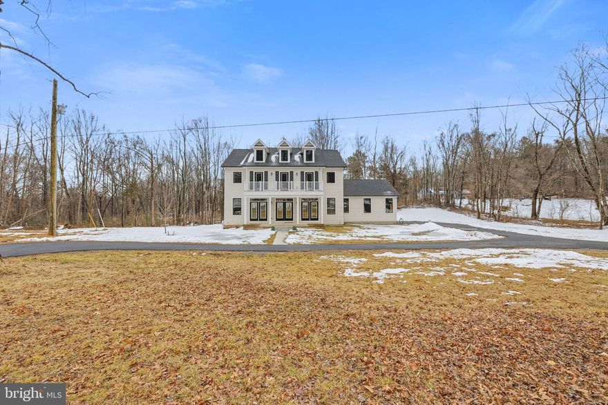 This stunning 4 bedroom, 4.5 bathroom oasis sits on a sprawling 5-acre lot, providing you with plenty of space to spread out and enjoy the tranquility of nature. Step inside and be amazed by the attention to detail throughout this home. 

The fully finished basement offers endless possibilities - a home office, game room, or even a movie theater! And don't worry about power outages, because this home comes equipped with a whole house generator ensuring that your comfort and convenience are never compromised. 

As you explore the main level, you'll notice the beautiful white siding and the striking Anderson 400 windows and doors in black, giving the home a modern yet classic look. The oak stairs with a carpet runner add a touch of elegance and warmth. But the real showstopper is the kitchen. The upgraded cabinets, oversized kitchen island, and 36" gas range and vent make this space a chef's dream. Picture yourself entertaining guests while they gather around the huge granite countertop island, or fill up their water bottles with the water bottle filler with build in chiller in the pantry. And don't forget about the pot filler - no more lugging heavy pots filled with water from the sink! 

The upgraded lighting package throughout the home sets the mood for any occasion. Whether it's fans with lights, recessed lighting, cove lighting, or the sconces on the fireplace, you have the perfect ambiance at your fingertips. And during the holiday season, the convenient holiday light plugs in the eaves make decorating a breeze. No detail has been overlooked, from the solid core doors to the spray foam insulation and full garage insulation, this home has been designed with your comfort in mind. There is a large paved wrap around driveway. The upgraded gutter size with gutter guard ensures that maintenance is a breeze. Even the bathrooms have been given the VIP treatment. Upgraded toilets with comfort height, elongated bowls, and soft-close lids offer a touch of luxury. And with custom tile in each bathroom, your morning routine will feel like a spa getaway. 

The master suite is a true retreat. With a tray ceiling and tray lighting, you'll feel like you're living in a five star hotel. The master shower with 2 separate shower heads and glass surround with custom brackets adds privacy and style. Every aspect of this home has been carefully thought out, including the high quality carpeting with premium padding on the lower level and in the bedrooms. LVP flooring on the main level, upper level landing and in the laundry room, and the step lights to the second floor are a thoughtful touch, making navigating in the dark a breeze, while two custom door give you access to the balcony. 

For your convenience, Comcast high speed internet is available and AV/IT locations have been placed in every room, making it easy to stay connected in today's digital world, and the oversized garage with upgraded lighting provides plenty of space for all your vehicles and projects. 

Last but not least, the 500-gallon underground propane tank ensures that your energy needs are met without any interruptions.