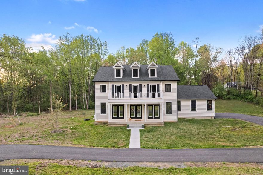 This stunning 4 bedroom, 4.5 bathroom oasis sits on a sprawling 5-acre lot, providing you with plenty of space to spread out and enjoy the tranquility of nature. Step inside and be amazed by the attention to detail throughout this home. 

The fully finished basement offers endless possibilities - a home office, game room, or even a movie theater! And don't worry about power outages, because this home comes equipped with a whole house generator ensuring that your comfort and convenience are never compromised. 

As you explore the main level, you'll notice the beautiful white siding and the striking Anderson 400 windows and doors in black, giving the home a modern yet classic look. The oak stairs with a carpet runner add a touch of elegance and warmth. But the real showstopper is the kitchen. The upgraded cabinets, oversized kitchen island, and 36" gas range and vent make this space a chef's dream. Picture yourself entertaining guests while they gather around the huge granite countertop island, or fill up their water bottles with the water bottle filler with build in chiller in the pantry. And don't forget about the pot filler - no more lugging heavy pots filled with water from the sink! 

The upgraded lighting package throughout the home sets the mood for any occasion. Whether it's fans with lights, recessed lighting, cove lighting, or the sconces on the fireplace, you have the perfect ambiance at your fingertips. And during the holiday season, the convenient holiday light plugs in the eaves make decorating a breeze. No detail has been overlooked, from the solid core doors to the spray foam insulation and full garage insulation, this home has been designed with your comfort in mind. There is a large paved wrap around driveway. The upgraded gutter size with gutter guard ensures that maintenance is a breeze. Even the bathrooms have been given the VIP treatment. Upgraded toilets with comfort height, elongated bowls, and soft-close lids offer a touch of luxury. And with custom tile in each bathroom, your morning routine will feel like a spa getaway. 

The master suite is a true retreat. With a tray ceiling and tray lighting, you'll feel like you're living in a five star hotel. The master shower with 2 separate shower heads and glass surround with custom brackets adds privacy and style. Every aspect of this home has been carefully thought out, including the high quality carpeting with premium padding on the lower level and in the bedrooms. LVP flooring on the main level, upper level landing and in the laundry room, and the step lights to the second floor are a thoughtful touch, making navigating in the dark a breeze, while two custom door give you access to the balcony. 

For your convenience, Comcast high speed internet is available and AV/IT locations have been placed in every room, making it easy to stay connected in today's digital world, and the oversized garage with upgraded lighting provides plenty of space for all your vehicles and projects. 

Last but not least, the 500-gallon underground propane tank ensures that your energy needs are met without any interruptions.