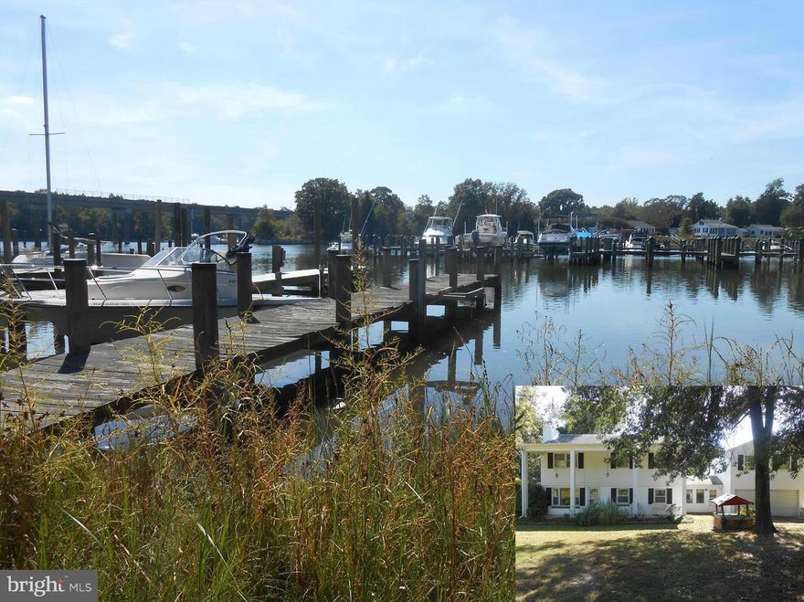 Spacious Colonial waterfront on ...99 acre lot with a pier. Hardwood floors in most rooms. Finished bonus room over garage. Full attic, separate den, 2 fireplaces, 2 car garage with a breezeway. Nice level lot. Home needs some TLC.  Priced right.