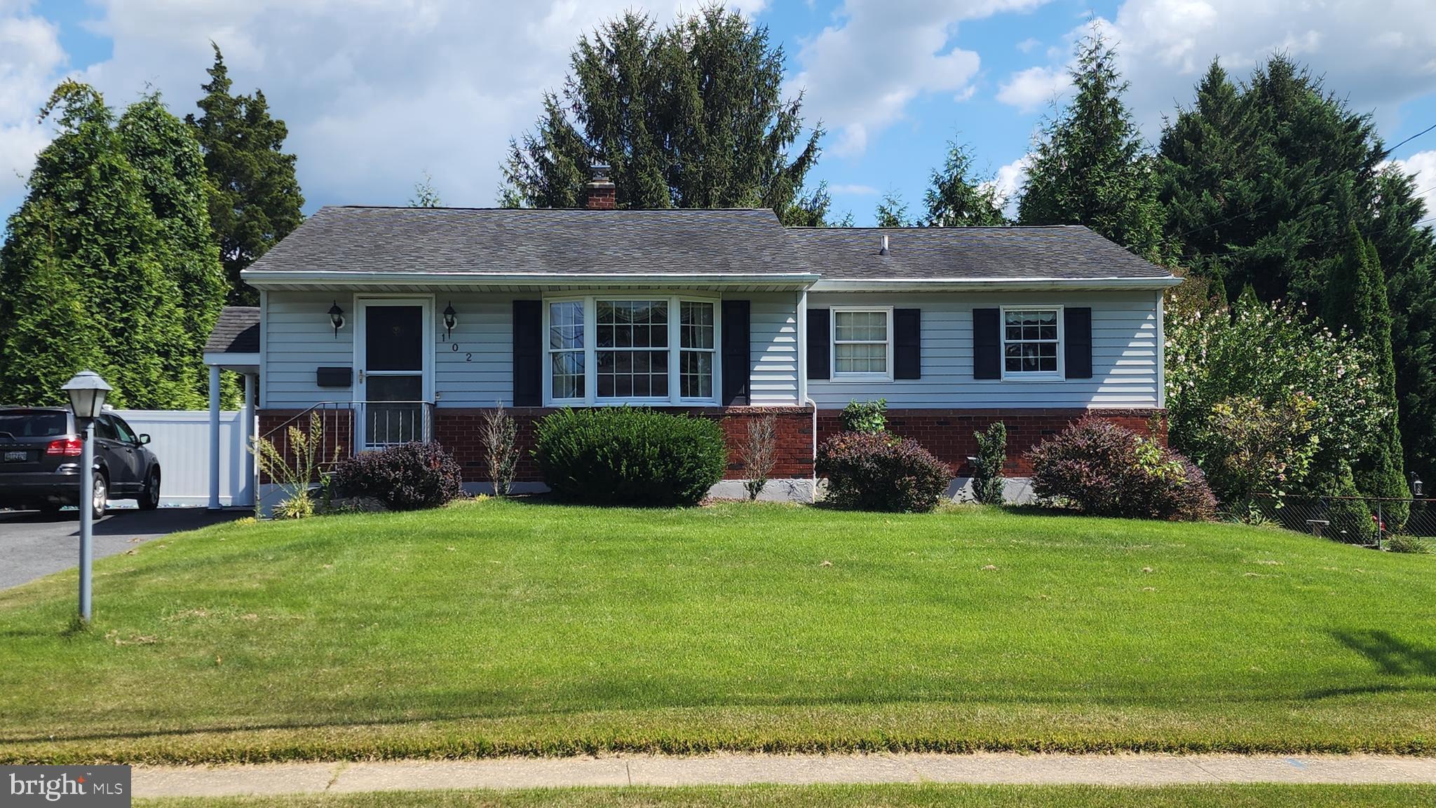 Tucked away on a tree-lined private lot with the convenience of walking distance to shopping, this 3 bedroom 1.5 bath ranch with finished basement has it all! The main level features 2 bedrooms and 1 full bath, a large eat in kitchen, spacious living room, and a separate dining room. Hardwood floor throughout and a beautiful wood sunroom addition that opens to the deck and gazebo—ideal for relaxing or entertaining! The fully finished basement has a natural gas stove fireplace and 3rd bedroom with half bath, plus an unfinished laundry/storage room with plenty of space to finish if desired and storage! Outside you’ll find a fenced yard, mature trees all around, a sitting area and a storage shed. A private setting with room to grow!