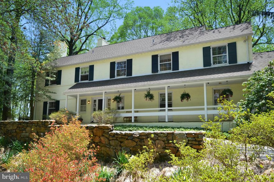 Fabulous 5 bedrooms & 4.5 Bath sits on spectacular 4.95 acres of park-like setting. Sitting high back off Ruxton Road down a long driveway with a awesome large flat lot.  A rare gem in this area. The 4700 sq ft home has a fabulous layout with  many over sized windows for stunning views and maximum natural light. Professionally landscaped gardens lead to in-ground pool and pool house.