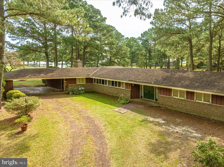 Back on market and reduced price!! Beautifull Waterfront Home in Annemessex Ridge!! Home is over 2500 sq ft and sits on 2 lots. Plus, an additional lot included.  The kitchen has beautiful cabinets and granite counter tops. Tons of cabinet and counter space.  The large living room has a gas burning fireplace. There is a nice family room with water views. The oversized porch is a great party room looking out over canal. The master suite is LARGE, with his and hers closets and master bath.  There are 2 more very large bedrooms and 2 baths.  The patio off the back of house leads to the dock and pier for your boats or jet skis!! The is extra lot is also rip rapped. The home has 2 septic's.