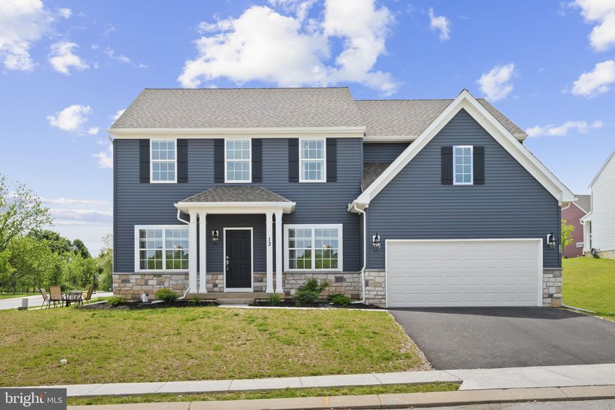 INSTANT EQUITY  in this home loaded with premium upgrades—far surpassing what you’d find in a standard new build. Why wait months to build when you can move right in now !!!Thoughtfully chosen, top-grade fixtures and finishes add exceptional value for the buyer.  Traditional Magnolia model single-family home, newly constructed in 2024 by Keystone Custom Homes, offering 3,490 square feet of elegant living space including 5 bedrooms, 3 full baths, 1 half bath, and a 2-car garage in desirable Cloverfield Farms. Showcasing beautiful luxury finishes throughout, the main level features a formal dining room with a timeless chandelier, a private office or study accessed through French doors, a dramatic 2-story family room with a cozy fireplace, a full bath, and a main-level bedroom—ideal for guests or multigenerational living. The stunning kitchen is outfitted with modern finishes and stainless steel appliances, complemented by ample cabinetry, quartz countertops, a classic white subway tile backsplash, an oversized island with pendant lighting and seating, and a sunlit breakfast area. Upstairs, discover a convenient laundry room and four spacious bedrooms, including the luxurious primary suite featuring a walk-in closet and a spa-inspired en-suite bath with a dual-sink vanity and upscale finishes. The finished lower level expands the living space with a large open recreation room, a half bath, and additional unfinished space perfect for storage or future customization. Enjoy the outdoors with ample space in the back and side yards, beautifully enhanced by lush, well-maintained landscaping.