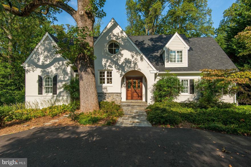 gorgeous renovated and expanded 4 bedroom, 4 full bath home on 1/2 acre in Country Club Hills