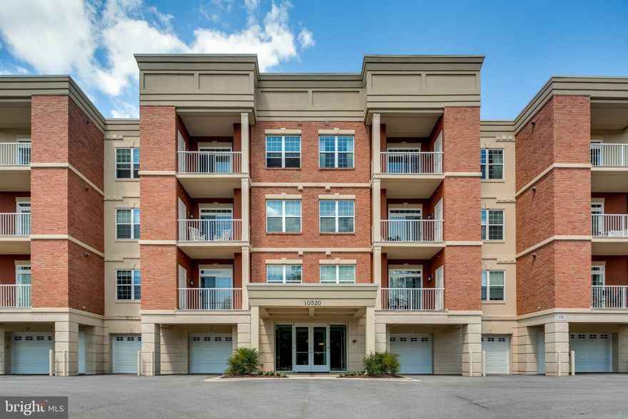 Live in the Lap of Luxury in this contemporary condominium at Turf Valley! Enjoy amazing views from this rear corner unit overlooking the Hialeah Golf Course.    The open concept floor plan features custom upgrades and designer finishes throughout. Gorgeous wide plank hardwood floors in foyer and kitchen. Upgraded plush carpet and cozy gas fireplace in living room, kitchen with 42"  White Maple Cabinetry, SS appliances, granite counter top, custom backsplash & island w/ pendant lights over breakfast bar.    Relax and enjoy golf course view from your private balcony. Retreat to the primary bedroom with a walk-in closet and luxurious bath with a double vanity, quartz counter and glass enclosed oversized shower. A second generously sized bedroom features two closets including one walk-in and a full bath with soaking tub, custom tiled backsplash and quartz vanity. A separate laundry room with storage closet and an oversized one car private garage with direct interior access to the lobby level of the building complete this amazing home! Convenient elevator building with secure entry. Enjoy the relaxed lifestyle located minutes from Turf Valley Town Square with wonderful dining and shopping options!