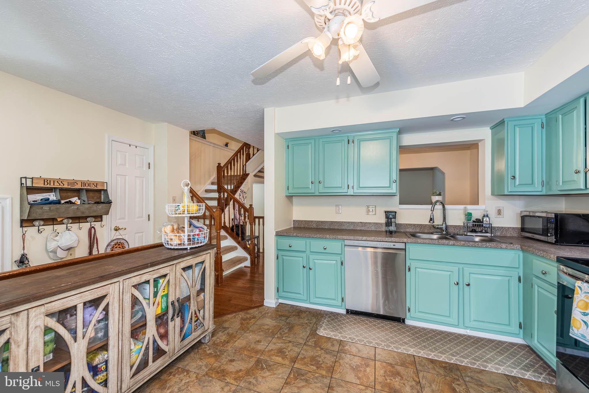307 SLOPING WOODS COURT