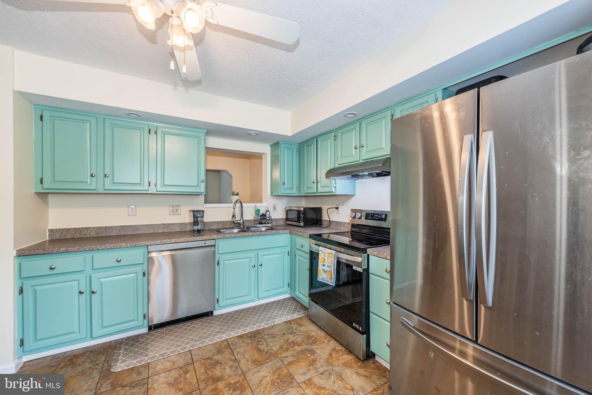 307 SLOPING WOODS COURT